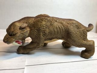 Safari Ltd Missing Links Smilodon Toy,  Prehistoric Saber Tooth Cat Tiger Figure