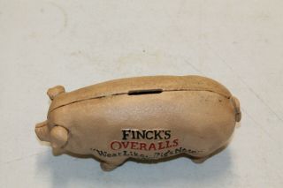 HEAVY CAST IRON FINCKS OVERALLS PIG HOG PIGGY BANK WEAR LIKE A PIGS NOSE 1885 3