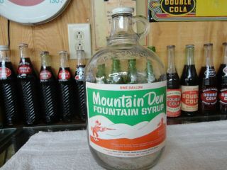 Mountain Dew Soda Fountain Syrup Paper Label 1 Gallon Jug Clear Glass Hillbilly