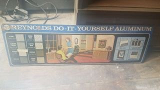 Vintage Reynolds Do It Yourself Aluminum Sign Rack Topper Display Ad Screen