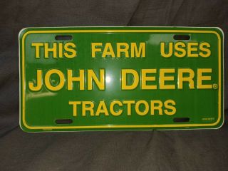 John Deere License Plate " This Farm Uses John Deere Tractors "