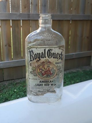 Antique/vintage Embossed And Labeled Royal Guest Brand Wine Bottle.