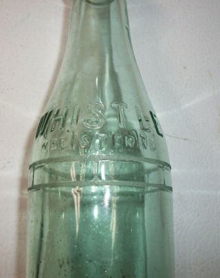Vintage Marietta,  Ohio Whistle 6 1/2 Fld.  Ozs.  Light Green Glass Soda Bottle.