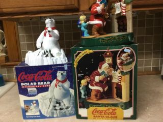 2 Coca Cola Santa Claus Mechanical Banks,  Santa And Polar Bear,  Heavy Metal
