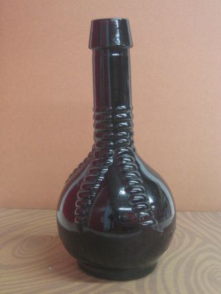 Vintage Amethyst 8 Inch Ball And Claw Bitters Bottle