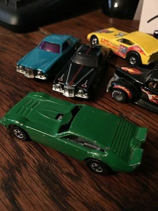 Redline hot wheel and other older collectible.  Cobra,  Mustang 4
