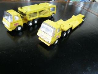 2 Vintage Tonka 2pc Trucks.  9” Car Carrier And 11” Flat Bed Truck