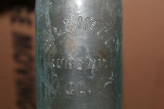 B.  B.  & Mfg.  Co.  Brunswick Georgia Ga Bottle Embossed Circle Slug Rare