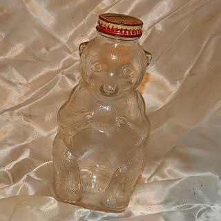 Snow Crest Beverages Inc Clear Glass Smiling Clown Bottle Bank 3