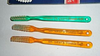 3 Vintage Dr West ' s Miracle Tuft Toothbrush ' s two Orange one Green 2