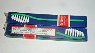 3 Vintage Dr West ' s Miracle Tuft Toothbrush ' s two Orange one Green 4