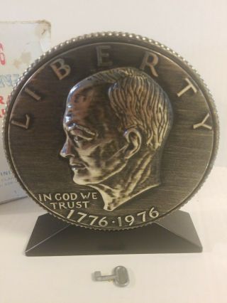 1776 - 1976 Bicentennial Quarter Coin Shaped Bank With Key Vacumet Finishing,  Inc.