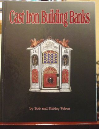Cast Iron Still Bank,  " Building Bank Book "