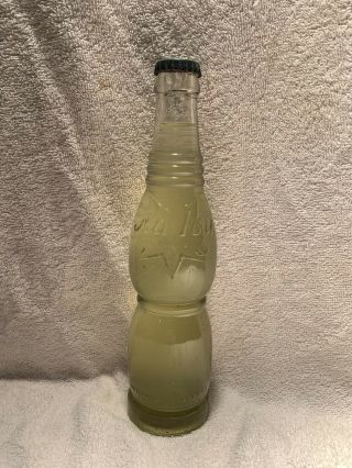 Full 8oz Nu - Icy Lemon Soda Embossed Soda Bottle
