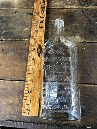 Antique Embossed DR.  TRAEGER & SON SCRANTON,  PA.  Tinted DEAD SHOT Bottle Poison 5