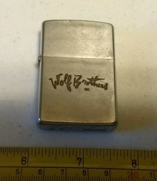 Vintage Wolf Brothers Inc Advertising Zippo Lighter