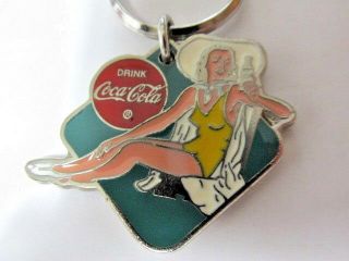 Very Rare Woman Enjoying Drinking Coca Cola Metal Silvertone Enamel Keychain