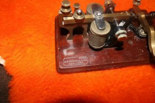 Antique J.  H.  Bunnell telegraph key and sounder combo on engraved wood base 3