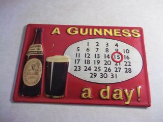 Vintage Guinness Beer Embossed Metal Calendar Sign Ireland Erie Bar Tavern