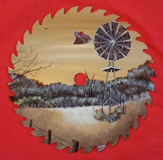 Hand Painted Saw Blade Windmill With A Serene Country Setting
