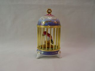 4.  25 " Porcelain Hand Painted Hinged Trinket Box Parrot In Footed Birdcage Phb