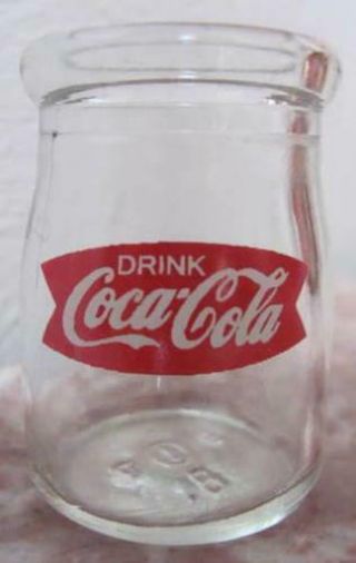 A Coca Cola Fishtail 3/4 " Oz.  Glass Coffee Creamer Bottle 1 7/8 " Tall