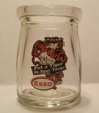 A Esso Tiger 1/2 " Oz.  Glass Coffee Creamer Bottle 1 5/8 " Tall