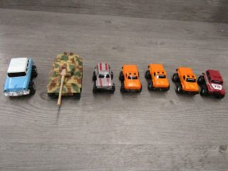 4 Schaper Stomper Toy Vehicles: Sr5,  Ford 4x4,  Jeep Renegade,  Chevy Nomad.