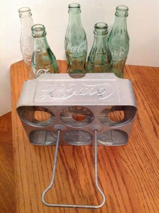Vtg Coca - Cola aluminum metal carrier with vintage bottles 2 w/raised lettering 7