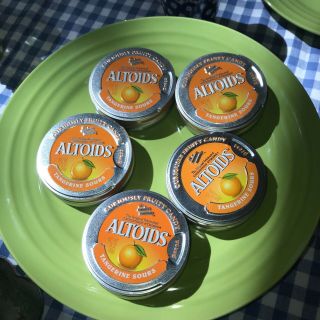 Five Altoid Tangerine Sours Tins With Tangerine Images On Front