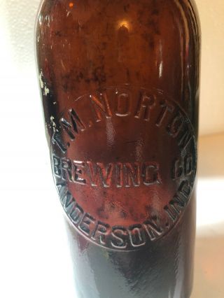 T.  M.  Norton Beer Bottle Anderson Ind Indiana Amber A B Co Base