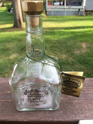 Empty Jack Daniels 1904 St.  Louis Worlds Fair Gold Metal Collectors Bottle -