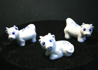 Set Of 3 Whimsical Blue And White Porcelain Miniature Cow Figurines