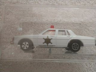 dukes of hazzard diecast cars.  3 total.  Jeep,  charger,  police car 4