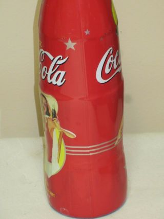 RARE COCA COLA 1L LIMITED WRAPPED BOTTLE FROM CANADA FULL NEVER OPENED 7