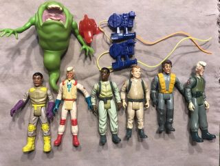Ghost Buster Action Figurines,  Slimer Green Ghost And Chomper And Proton Guns
