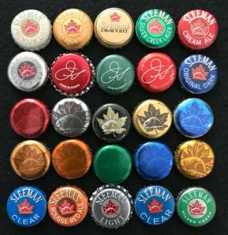 25 Different Sleeman Canadian Caps/crowns,  Plastic Backed