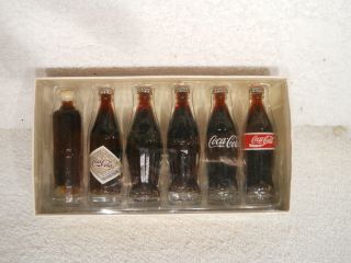 100 Anniversary Evolution Of The Coca Cola Contour Bottle 6 Mini Bottles