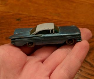 Vintage 1961 Lesney Matchbox 57 Chevrolet Impala Silver Wheels Dk Blue Base