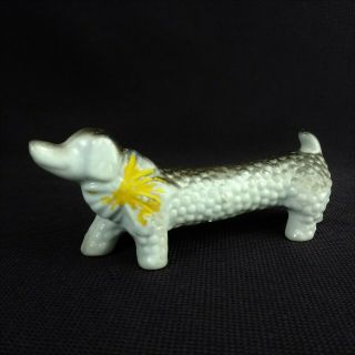 Vintage Dachshund Weiner Dog Figurine With Yellow Ribbon Bow