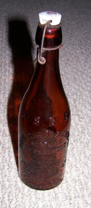 Vintage Adam Scheidt Brewing Brown Embossed Beer Bottle With Porcelain Stopper
