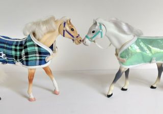 Two 6.  5 " Grand Champion Toy Horses With Moving Heads White And Beige