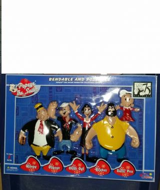A Set Of Popeye Bendables Including Wimpy Olive Oyl Brutus And Swee 