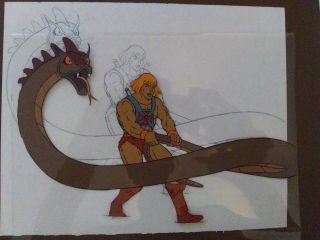 He - man Animation cel from cartoon and sketch of he man fighting snake 3