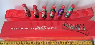 100 Years Of The Coca Cola Set Of 6 Mini Coke Aluminum Bottles With Stand 2014