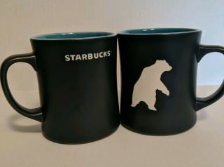 Starbucks 2012 Coffee Mug Yukon Polar Bear Set Of 2.  Bone China 16 Oz Cups Black