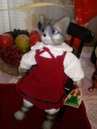 Cat Porcelain Doll Sitting In A Black Rocking Chair House Of Global Art