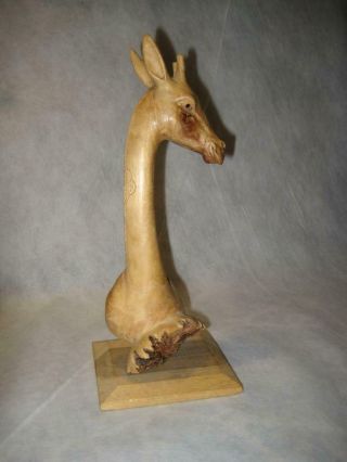10.  5 " Tall Hand Carved Wood Giraffe