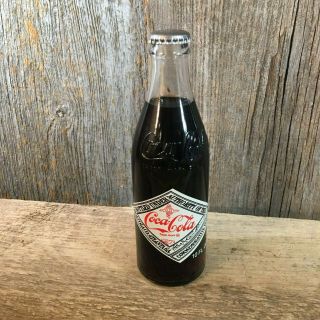 Coca Cola 10 Oz.  Commemorative Bottle 75th Anniversary Dallas Texas