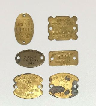 6 Antique Michigan Brass Dog Licenses Tags 1918,  29,  35,  47,  48
